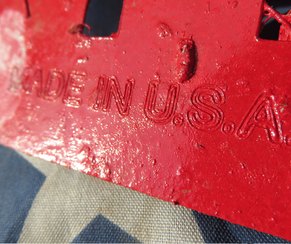 Made in the USA stamped into red metal