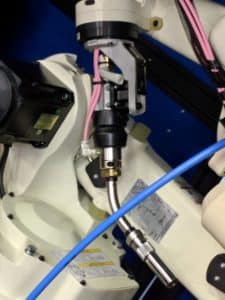 Close-up shot of a cell welder and wires.
