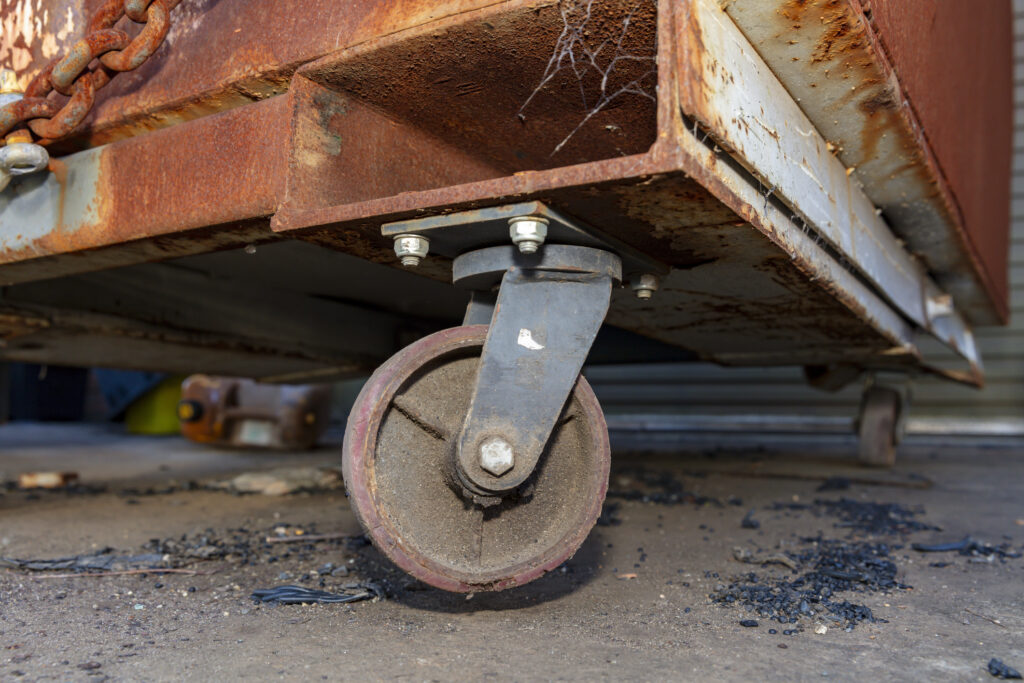 Rusty corroded caster wheel will need to be soaked before removal